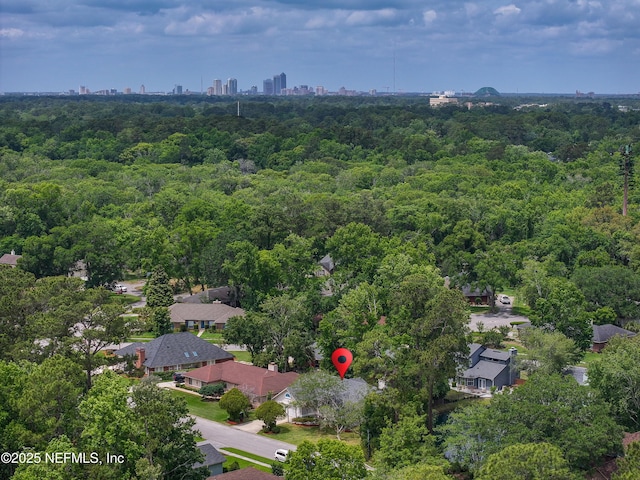 aerial view featuring a forest view