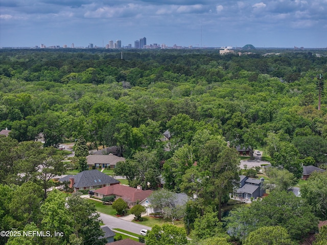 aerial view featuring a view of trees