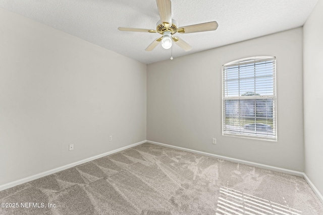1605 Vineland Cir Unit B, Fleming Island, FL 32003 - carpeted spare room featuring a ceiling fan, baseboards, and a textured ceiling