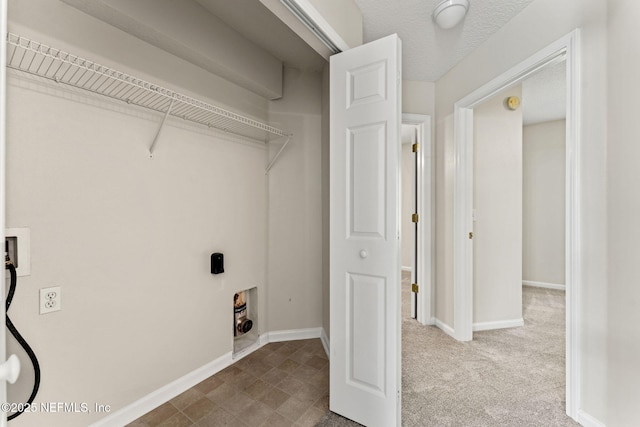 1605 Vineland Cir Unit B, Fleming Island, FL 32003 - laundry room with baseboards, hookup for a washing machine, and laundry area