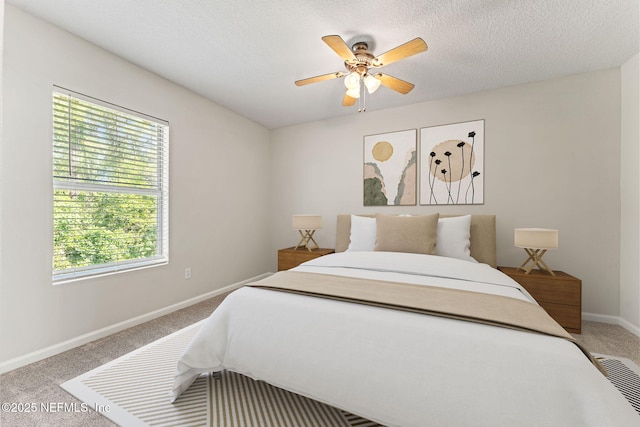 1605 Vineland Cir Unit B, Fleming Island, FL 32003 - bedroom with carpet, baseboards, and ceiling fan