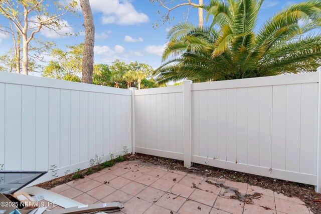 7908 Los Robles Ct Unit 7908, Jacksonville, FL 32256 - view of patio / terrace featuring fence