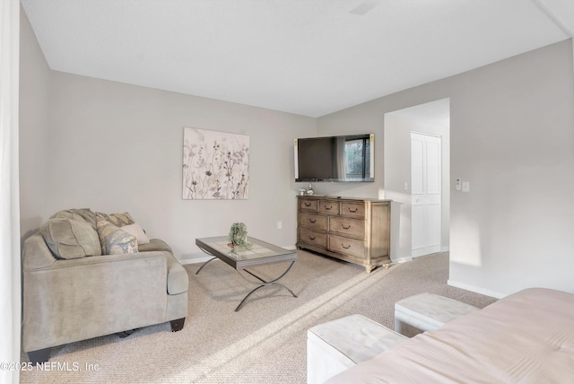 7908 Los Robles Ct Unit 7908, Jacksonville, FL 32256 - living room featuring baseboards and light carpet