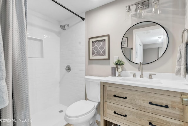 7908 Los Robles Ct Unit 7908, Jacksonville, FL 32256 - bathroom with a tile shower, toilet, and vanity
