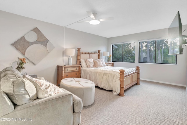 7908 Los Robles Ct Unit 7908, Jacksonville, FL 32256 - bedroom featuring ceiling fan, baseboards, and light carpet