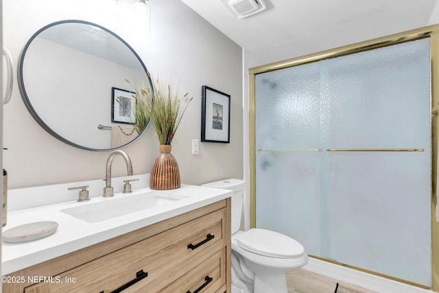 7908 Los Robles Ct Unit 7908, Jacksonville, FL 32256 - full bathroom with visible vents, a stall shower, toilet, and vanity