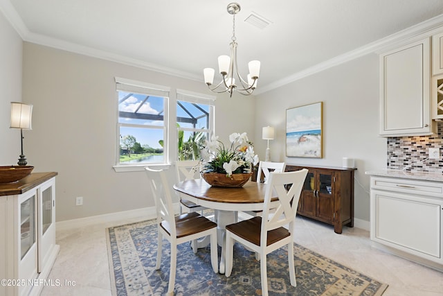 dining space featuring an inviting chandelier, baseboards, crown molding, and visible vents