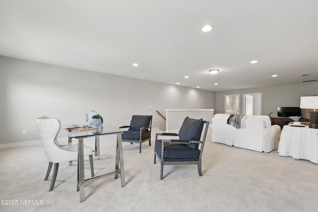 interior space featuring light colored carpet, recessed lighting, and baseboards