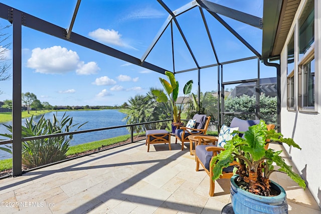 sunroom / solarium with a water view