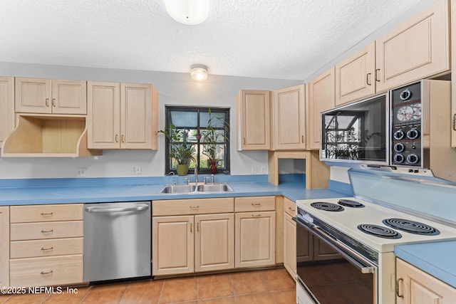 2848 Cedarcrest Dr, Orange Park, FL 32073 - kitchen with white range with electric cooktop, light brown cabinets, stainless steel dishwasher, and a sink