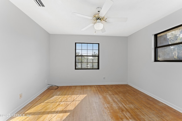 2848 Cedarcrest Dr, Orange Park, FL 32073 - unfurnished room featuring light wood finished floors, baseboards, ceiling fan, and visible vents