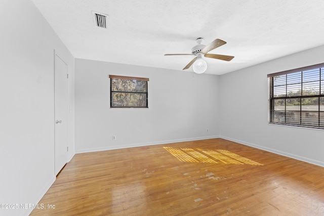 2848 Cedarcrest Dr, Orange Park, FL 32073 - unfurnished room featuring baseboards, a ceiling fan, visible vents, and light wood-style flooring