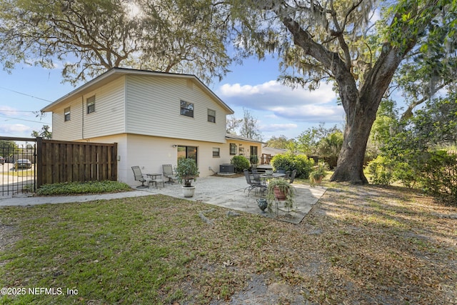 2848 Cedarcrest Dr, Orange Park, FL 32073 - back of house with fence, cooling unit, and a patio