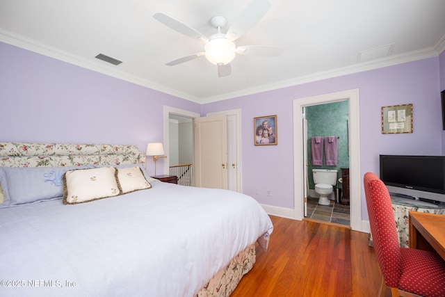 2127 River Rd, Jacksonville, FL 32207 - bedroom with wood finished floors, ornamental molding, connected bathroom, and a ceiling fan