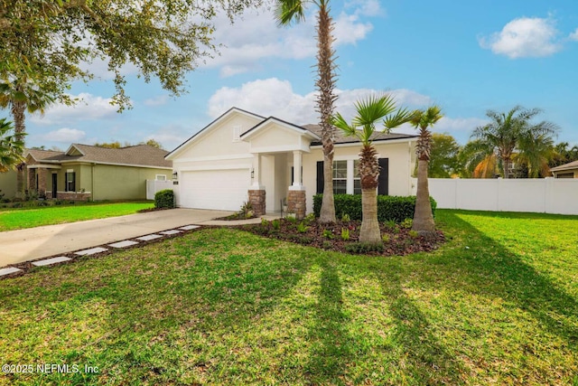 ranch-style home with fence, driveway, a front yard, and stucco siding