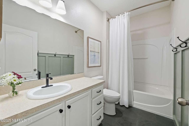 full bath featuring shower / bath combination with curtain, tile patterned floors, vanity, and toilet