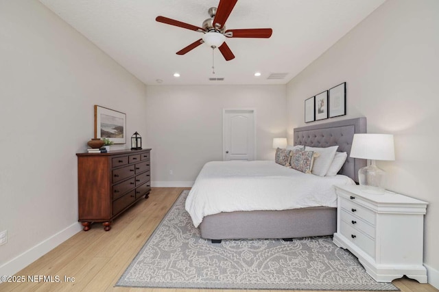 bedroom with light wood-type flooring, baseboards, visible vents, and recessed lighting