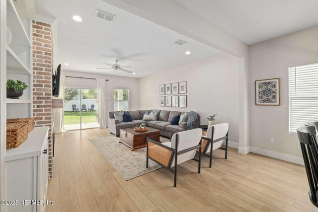 120 Corey Cay Ave, Saint Augustine, FL 32092 - living area with ceiling fan, light wood finished floors, baseboards, recessed lighting, and a textured ceiling