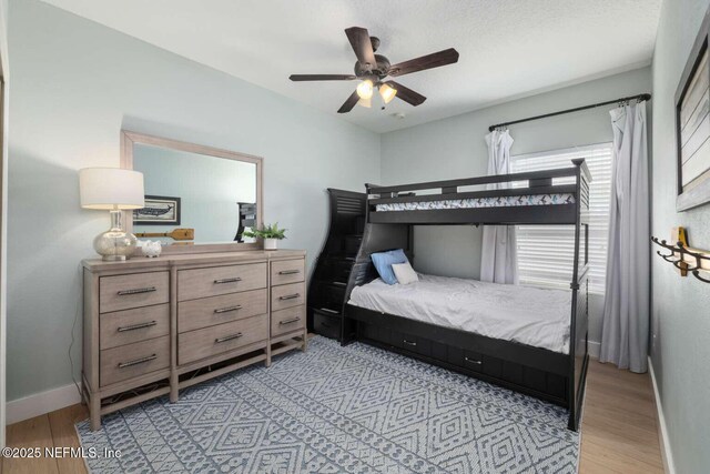 120 Corey Cay Ave, Saint Augustine, FL 32092 - bedroom featuring light wood-style flooring, baseboards, and a ceiling fan
