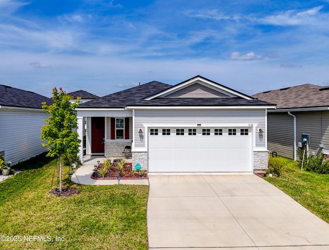 7142 Mahogany Run Dr, Jacksonville, FL 32244 - single story home with an attached garage, stone siding, a front yard, and concrete driveway