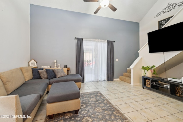 8634 Greatpine Ln W, Jacksonville, FL 32244 - living area featuring tile patterned floors, stairway, high vaulted ceiling, and ceiling fan