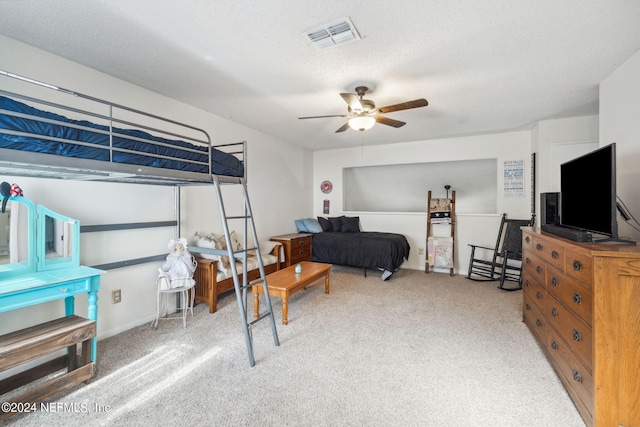 8634 Greatpine Ln W, Jacksonville, FL 32244 - carpeted bedroom with a ceiling fan, visible vents, and a textured ceiling