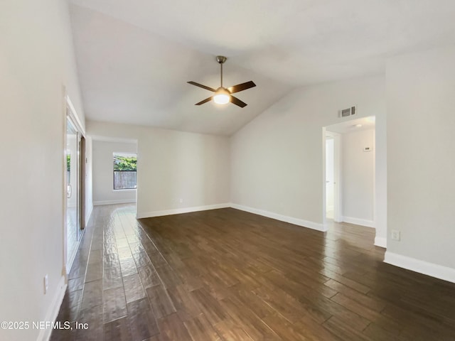 3444 Excalibur Way E, Jacksonville, FL 32223 - unfurnished living room featuring ceiling fan, vaulted ceiling, visible vents, baseboards, and dark wood-style flooring