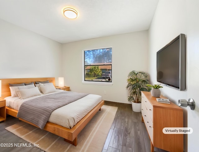 3444 Excalibur Way E, Jacksonville, FL 32223 - bedroom with baseboards and wood finished floors
