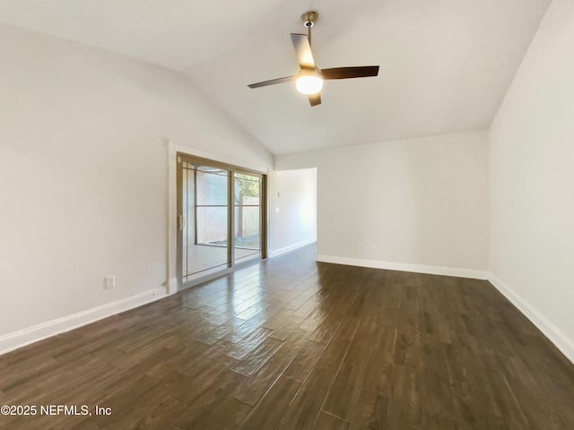 3444 Excalibur Way E, Jacksonville, FL 32223 - spare room with dark wood finished floors, vaulted ceiling, a ceiling fan, and baseboards