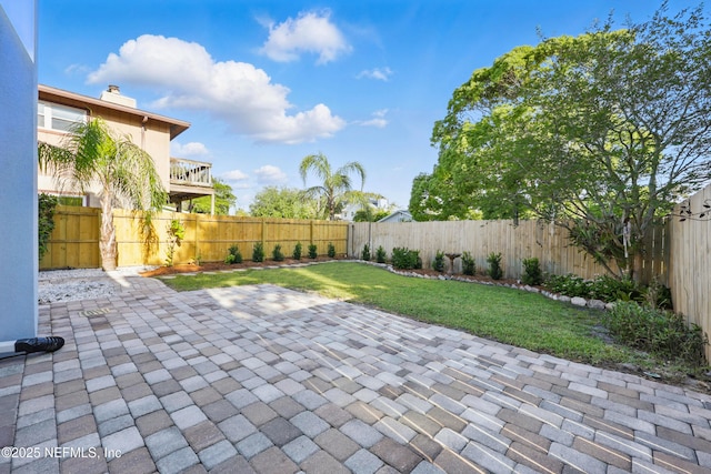 view of patio featuring a fenced backyard