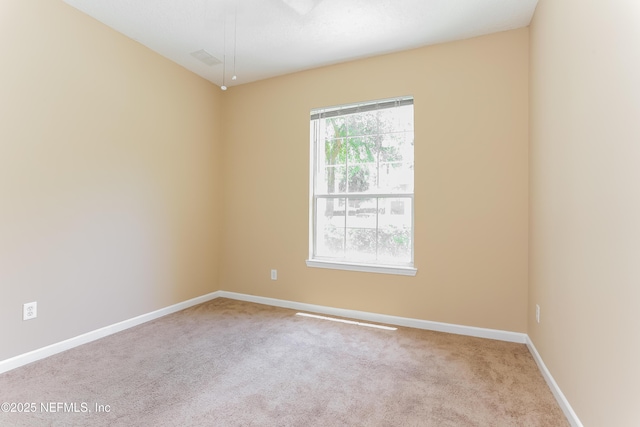 8601 Beach Blvd Unit 1202, Jacksonville, FL 32216 - unfurnished room featuring carpet floors and baseboards