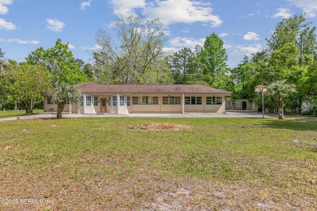 45121 Stratton Rd, Callahan, FL 32011 - back of house with a lawn