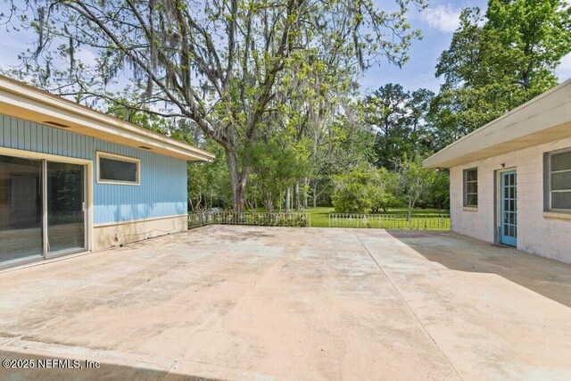 45121 Stratton Rd, Callahan, FL 32011 - view of patio / terrace featuring fence