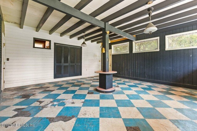 45121 Stratton Rd, Callahan, FL 32011 - unfurnished sunroom with beam ceiling