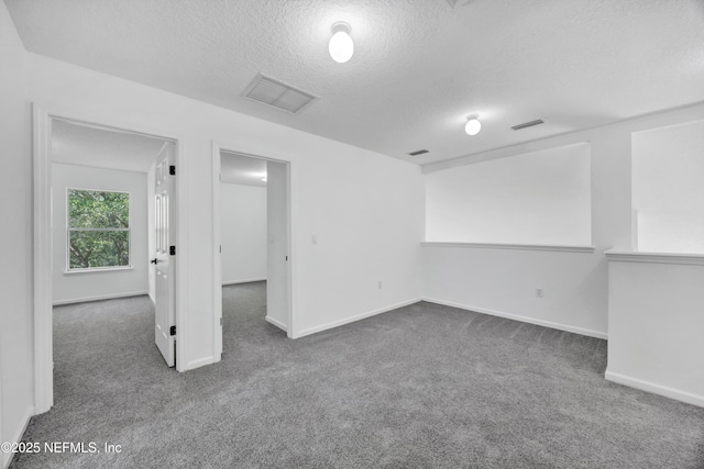 1829 Creekview Dr, Green Cove Springs, FL 32043 - carpeted empty room with a textured ceiling, visible vents, and baseboards