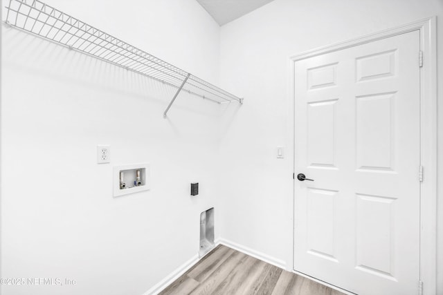1829 Creekview Dr, Green Cove Springs, FL 32043 - washroom featuring light wood finished floors, baseboards, washer hookup, electric dryer hookup, and laundry area