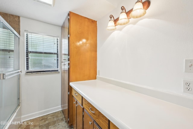 12054 Correa Ct, Jacksonville, FL 32246 - full bath with enclosed tub / shower combo and baseboards