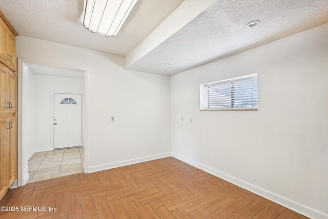 12054 Correa Ct, Jacksonville, FL 32246 - spare room featuring baseboards and a textured ceiling