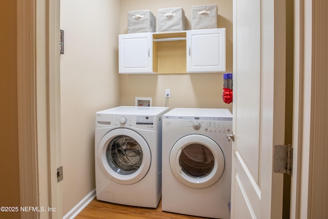 920 Gallier Pl, Jacksonville, FL 32259 - laundry room featuring washing machine and clothes dryer, baseboards, light wood-style floors, and laundry area