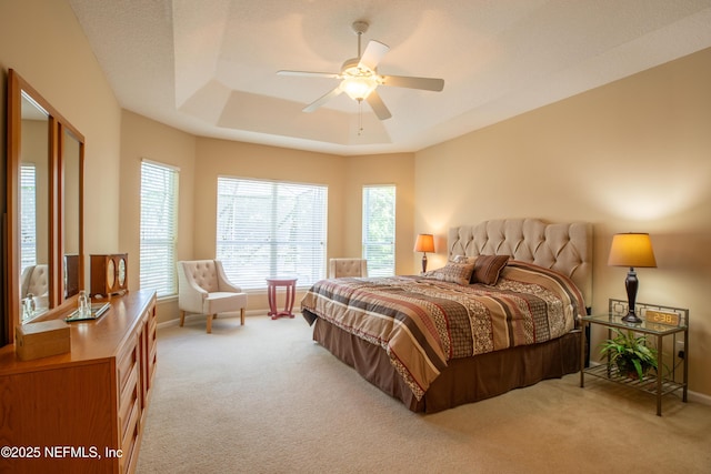 920 Gallier Pl, Jacksonville, FL 32259 - bedroom featuring a tray ceiling, baseboards, light colored carpet, and ceiling fan