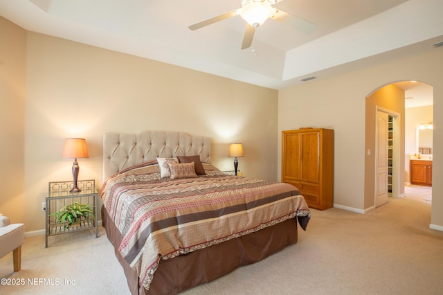 920 Gallier Pl, Jacksonville, FL 32259 - bedroom featuring light carpet, visible vents, arched walkways, and a raised ceiling