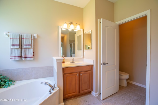 920 Gallier Pl, Jacksonville, FL 32259 - bathroom with tile patterned floors, a garden tub, vanity, and toilet
