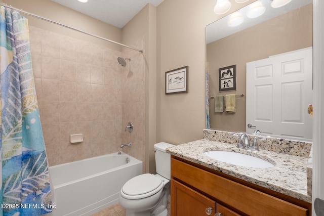 bathroom featuring toilet, shower / bath combo, and vanity