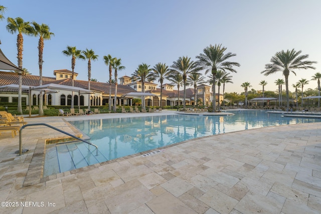 community pool with a patio