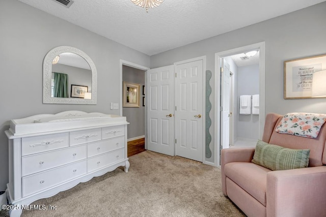 1104 Creekwood Way, Saint Johns, FL 32259 - sitting room with light colored carpet and a textured ceiling