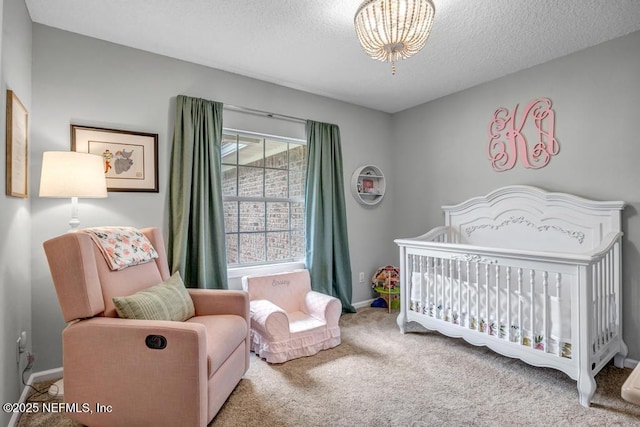 1104 Creekwood Way, Saint Johns, FL 32259 - carpeted bedroom with a crib, a textured ceiling, and a chandelier