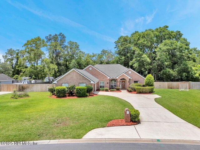 1104 Creekwood Way, Saint Johns, FL 32259 - view of front of property featuring brick siding and driveway