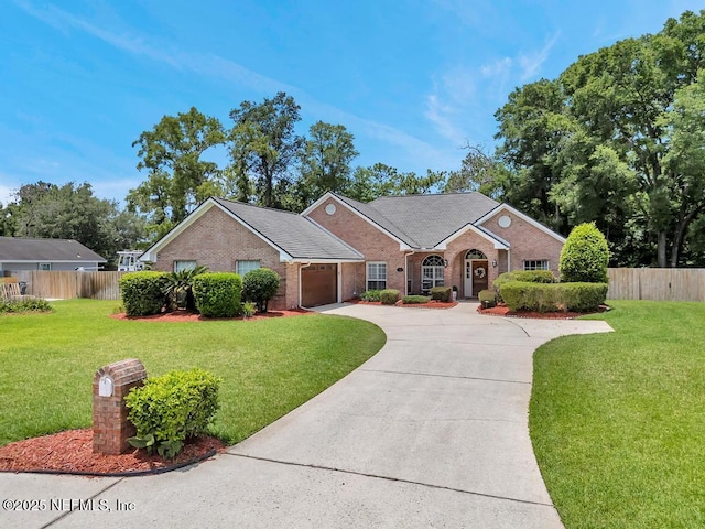 1104 Creekwood Way, Saint Johns, FL 32259 - view of front of property featuring brick siding, a garage, and driveway