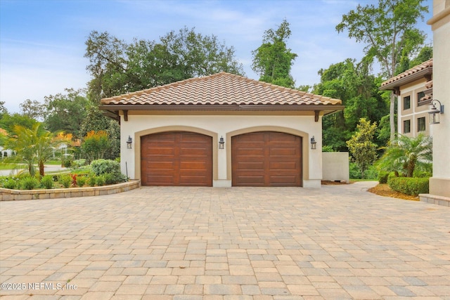 106 Villa Sovana Ct, Saint Johns, FL 32259 - garage with decorative driveway