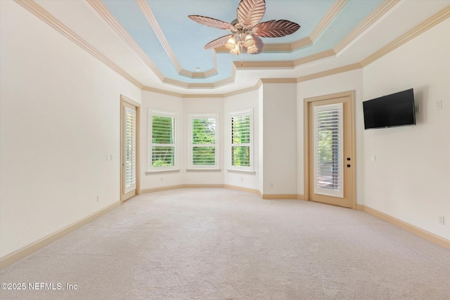 106 Villa Sovana Ct, Saint Johns, FL 32259 - carpeted spare room featuring a tray ceiling, ornamental molding, baseboards, and a ceiling fan